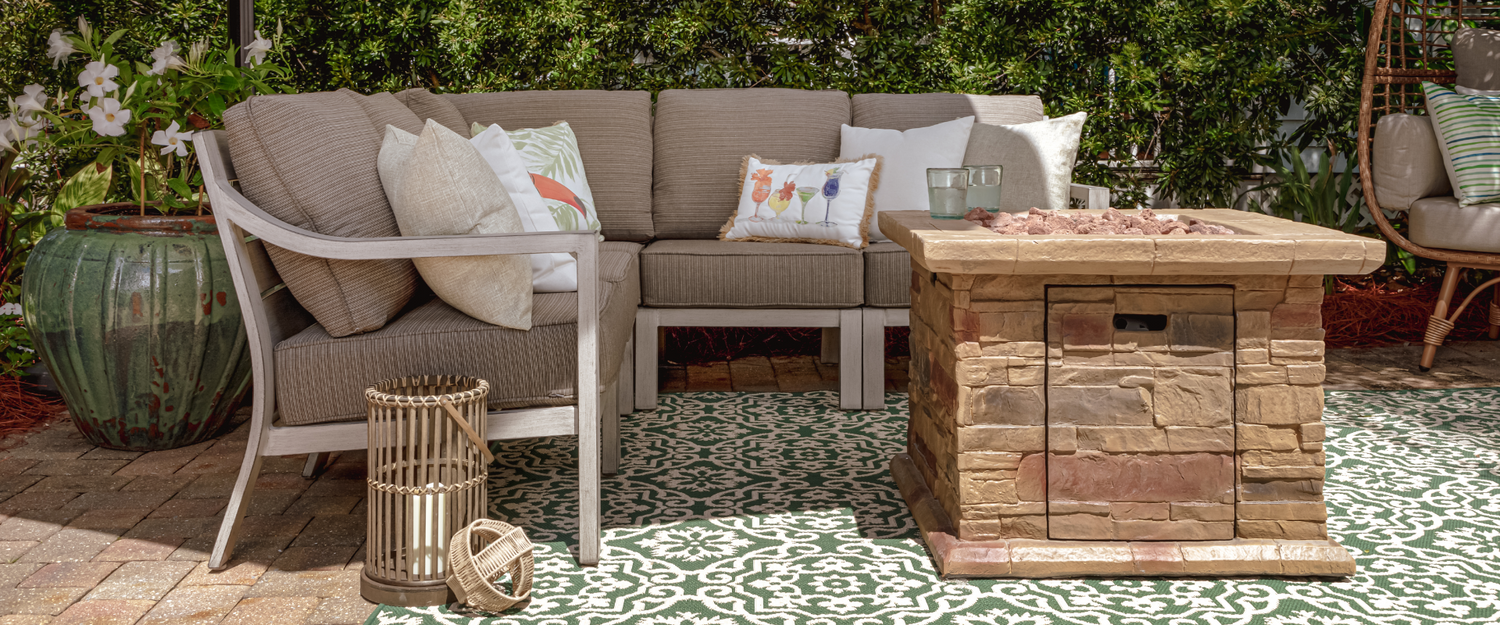 Outdoor Sectional with Fire Pit and Decorative Pillows