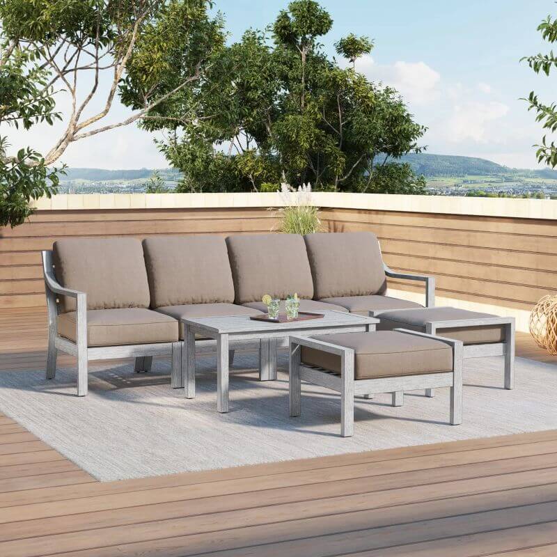 tan outdoor sofa with coffee table and ottoman