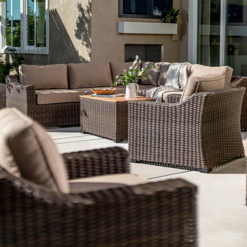outdoor sectional sofa by table